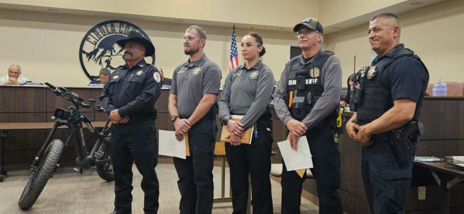 Sheriff Larry Diaz presented three deputies awards for their work in apprehending John Karl Areianna Crowson - CC