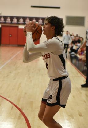 Sophomore Coudy Melonas of the Grants High School boys basketball team steadies himself for a wide open trey at a recent home game. The Pirates are ranked 8th in the state and are currently 3rd in district 5 4-A with a current record of 14-8, 2-2. Franklin Romero - CC