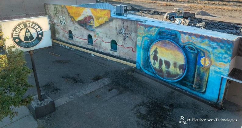 This vibrant mural on Kenneth Brown Photography highlights the iconic Route 66, local heritage, and the art of photography, brought to life through the collaboration of talented artists and the Grants MainStreet Project. Courtesy of Matt Fletcher