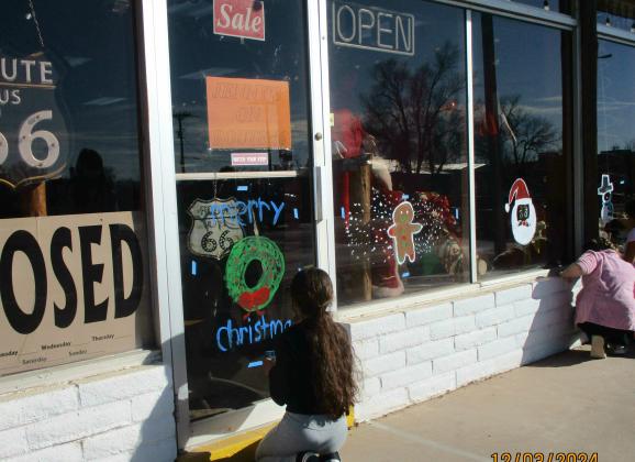 Backpack Program Annual Holiday Window Painting