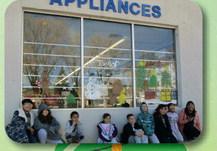 Backpack Program Annual Holiday Window Painting