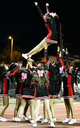 1-2-3 Let's go Pirates! The Grants High School cheer team in full force two weeks age at the GHS football game. Franklin Romero - CC