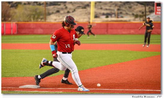 Nikko Young, 13, safe at first base after St. Pius first baseman drops the ball. Though the Pirates had opportunities they were unable to defeat district Rival, St. Pius at home last week. The final score was 2-1 St. Pius in an intense baseball game. Franklin Romero - CC