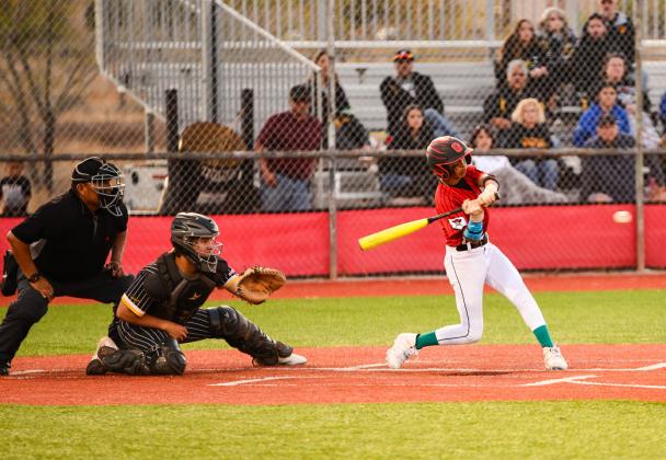 Joziah Ortega, 15, swinging his bat for a base hit last week against district rival St. Pius (14-11, 7-0). The Pirates lost a close game by a score of 2-1. That win allowed St. Pius to be the outright number one team in district 5-4A. The Pirates are currently second in their district with a record of 15-6,5-2 and ranked third in the state just behind St. Pius who is ranked second. Franklin Romero - CC