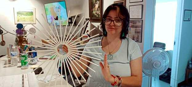 GRANTS, NM -- This ingenious sunburst wreath was made at the Saturday, September 7, Art Camp. Cibola Arts Council Art Director Thia Ray led the group in making this project, which is full of colorful possibilities. The straws glued to an embroidery ring can be decorated and colored with whatever entices its creators' imagination. Kathryn Marmon - CC