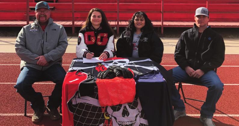 Kylie Garcia. - CC Pictured from left to right; Jeffrey Simpson, Kristina Simpson, Janice Simpson, and Wyatt Simpson, all gathered to witness Kristina signing to play college soccer with the University of the Southwest.