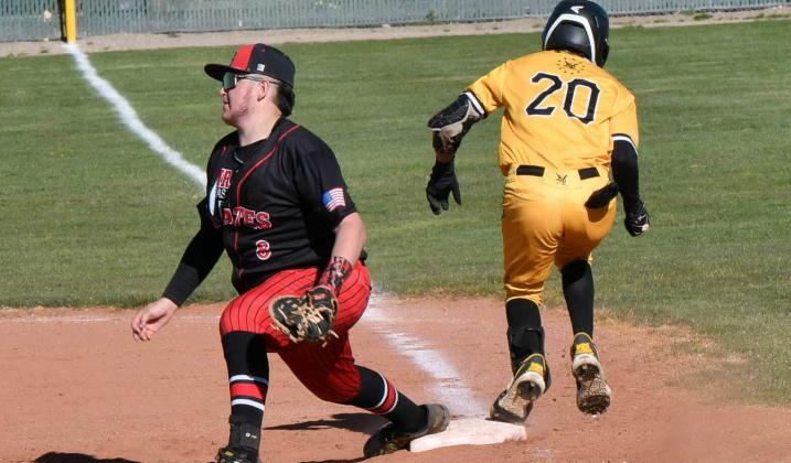 Baseball battle! Number two ranked Pirates to take on number one ranked St. Pius at home on Tuesday, April 18. In this file photo, first baseman Gabriel Marquez, 8, of the Grants Pirates Baseball team nabs a quick out against St. Pius Sartans at a recent game in Albuquerque. The Pirates won that contest by a score of 10-9 on March 31. Franklin Romero - CC
