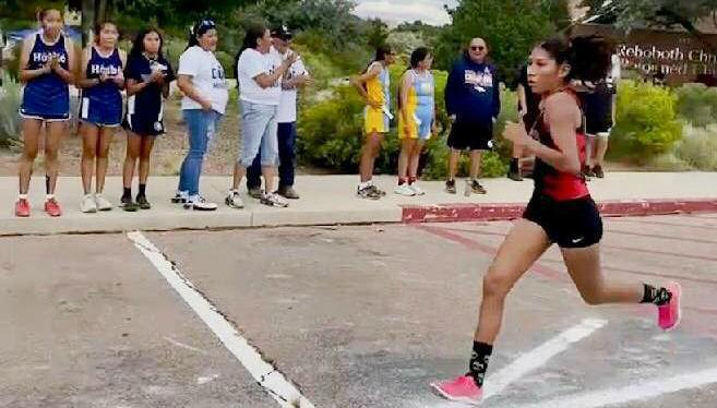 Laila Martinez of the GHS Cross Country team gets her stride going at a recent meet. Franklin Romero - CC