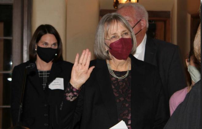 President Carolyn Wolf is sworn in by New Mexico Supreme Court Justice Shannon Bacon