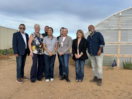 Deb Haaland, center, joins Grants Community Pantry ExecuCibola County dignitaries, including City of Grants Councilman George Garcia and members of the Cibola Health Council posed in the pantry’s Community Garden following a tour Friday, Aug. 21. Haaland visited the Grants facility as part of her Roadrunnin’ Tour and heard about food insecurity, rural service access and other challenges facing Cibola County and western New Mexico.