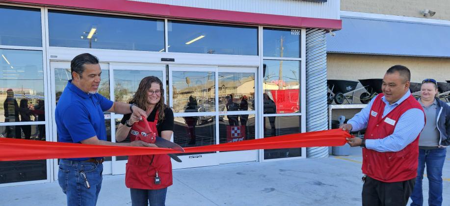Store Manager Brenda Little cuts the red ribbon announcing the grand opening of Tractor Supply Co. Arieanna Crowson - CC