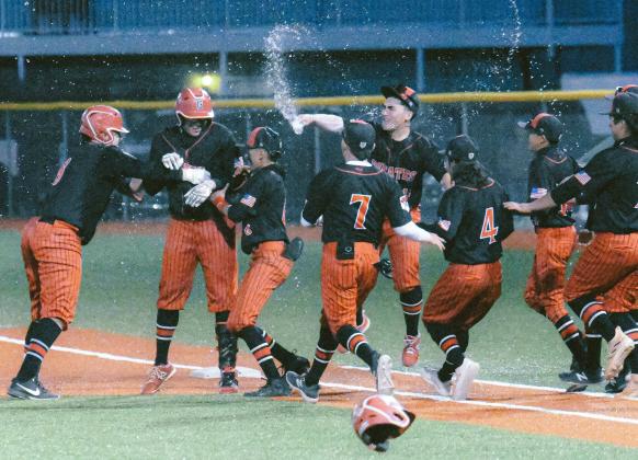 Pirates celebrate after defeating district rival the Belen Eagles (18-7,4-4) who are also ranked third in the state in 4A baseball. In a defensive battle the Pirates won by a score of 2-1. Franklin Romero - CC
