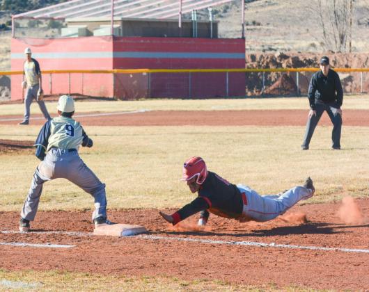 Safe! GHS senior Mauricio Chavez is safe at first base at a recent home game against the Del Norte Knights (1-7) this past weekend. The Pirates dominated the Knights in doubleheader action by a score of 15-4 and 18-0. Franklin Romero - CC