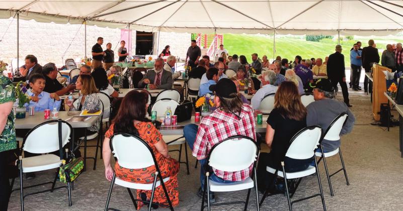 Guests fill in seats and converse as they wait for the 2021 annual NWNMCOG luncheon, held at Coyote Del Malpais Golf Course, to begin. Kylie Garcia - CC