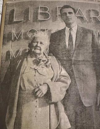 Mother Whiteside stands with mining executive and philanthropist Vernon Taylor in front of the newly dedicated Mother Whiteside Municipal Library in 1954. The building’s creation was made possible by a donation from Taylor and decades of grassroots work by the women of the Pilot Club.