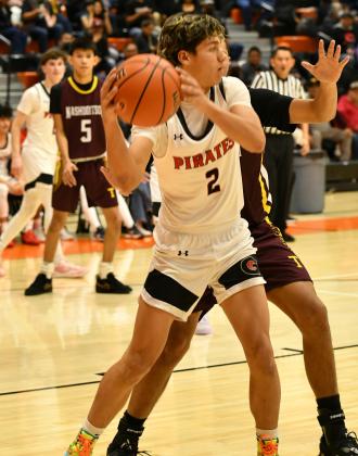 Coudy Melonas, 2, with the ball at a recent game in Gallup. The GHS boys’ basketball team is 8-8 going into district play this week. They start off district play with the Valencia Jaguars on Tuesday, January 21 and will travel to St. Pius on Friday, January 24. Franklin Romero - CC