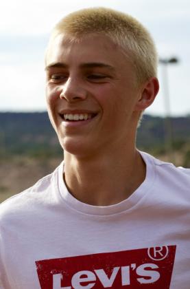 Junior Glade Gerber smiles during boys soccer tryouts on Aug. 10 at Grants High School in Grants, N.M. Jay Langford-Student Journalist