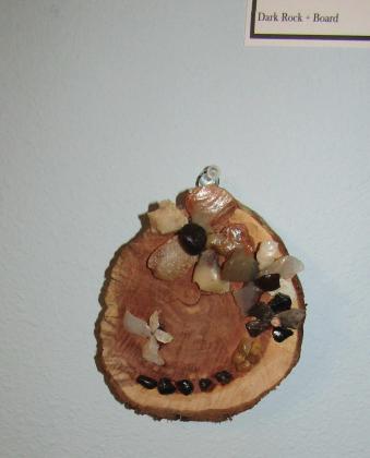 Showcasing another piece by Hawk Platero, and a piece by Candace Lee. Photos by Roger Siegmann