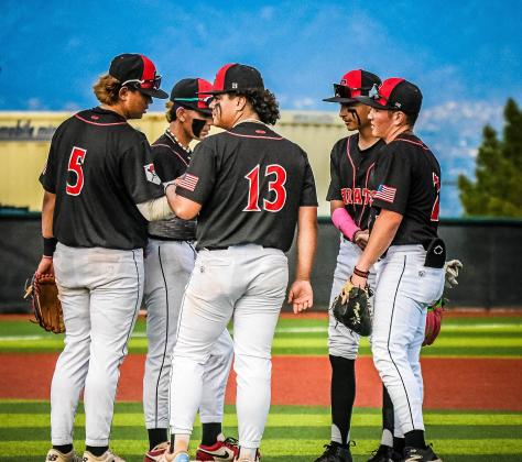 Niko Young, 13, converses with teammates at a state tournament game last month. Young was named district 5 4-A pitcher of the year for a second time this year. 'It's a good feeling getting this award,' said Young Franklin Romero - CC