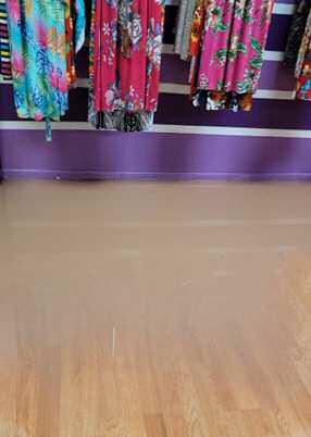 The Glamour Girl on First Street suffered flood waters seeped underneath the wall from the business next door. Photo courtesy of Beny Guzman