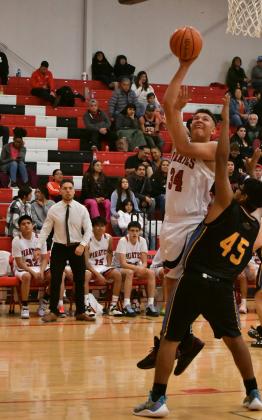 Let me in there! Big man Dominick Gonzales, 24, to the hole for the Pirates last week in the 75-55 win over the Bloomfield Bobcats. The Pirates will play against the Taos Tigers in their next game on Friday, December 2nd on the road. Franklin Romero - CC