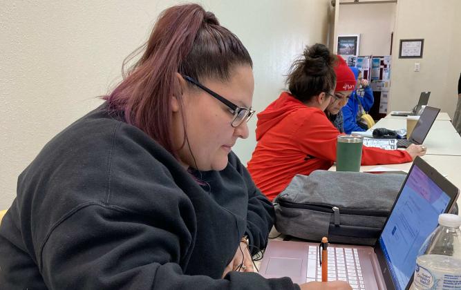 Cassandra, an Adult Ed student hard at work. Faith Mosley - CC