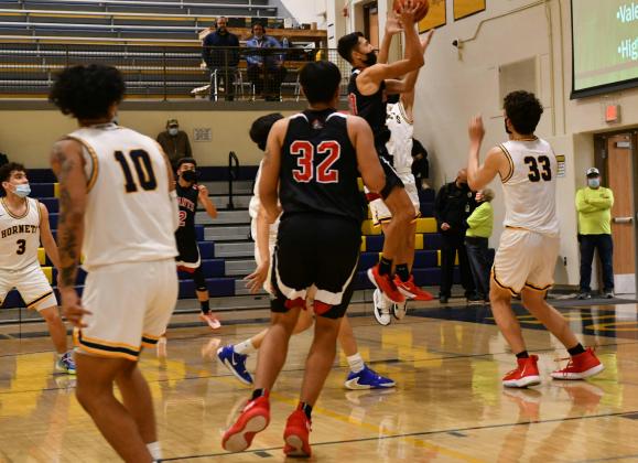 GHS senior Nicolas "Nico" Miera, 10, with a drive against Highland High School at an away game earlier in the month. The Pirates will host Highland (18-3, 6-0) on Tuesday, February 15 as both the boys and girls basketball teams wrap up district play this week. Franklin Romero - CC