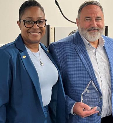 COSCA President Regina deChabert Petersen (left) and Artie Pepin, with the Kenneth P. Palmer Distinguished Service Award Courtesy Photo