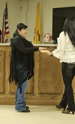 Arieanna Crowson - CC Board Trustee Monica Sandoval is sworn in by Village Clerk Denise Baca for her first year as a board trustee.