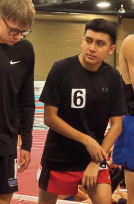 Senior John Paul Miller readies himself at a recent indoor track meet in Albuquerque. Miller is a top competitor in the 800 meter and 1600-meter races. Franklin Romero - CC