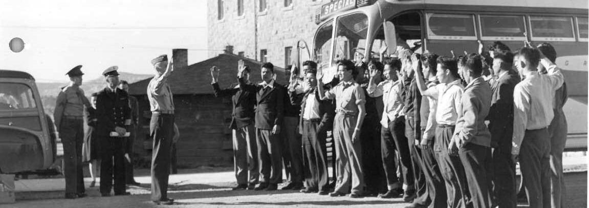 Photograph of the first 29 Navajo U.S. Marine Corps Code-Talker Recruits being Sworn in at Fort Wingate, NM, dated 1942. National Archives Identifier: 295175. Courtesy Photo