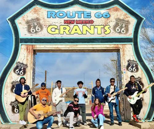 The Noypi Band strikes a pose at the iconic Route 66 Neon Drive-Thru arch at W Santa Fe Avenue. Courtesy Photo
