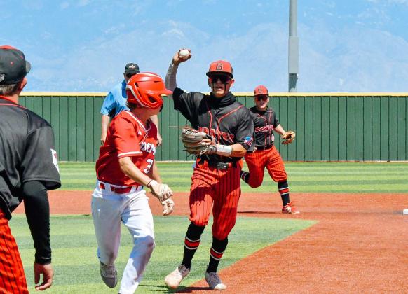 Izeyah Manzanares,24, of the GHS baseball team catches a base thief at first base for an out this past Thursday, in the quarter finals of the 4A state baseball tournament. The Pirates lost to the Abuquerque Charges by a score of 7-5 Franklin Romero - CC