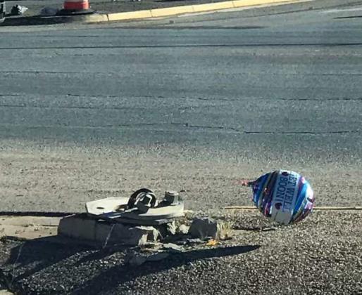 A resident of Grants attached a “Get Well Soon” balloon to the downed traffic light at the intersection of Santa Fe Avenue and NM Highway 53. The traffic light was knocked down in early May after a high-speed police pursuit. City residents have been dealing with the aftermath ever since, with city leadership working through supply chain issues to get a new light pole installed. Courtesy Photo