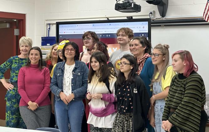 Grants High School Students pose with philanthropists and leaders from Popejoy Hall after the students were informed that they earned tickets and backstage access to the Broadway show Clue and will be among the first New Mexican’s to see the show. Diego Lopez - CC