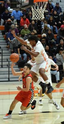 Sophomore Daniel Garcia, 13, takes it to the hole at a recent game against Gallup High School in Gallup. The Pirates went 2-1 at a recent tournament in Bernalillo and will head back to the 82nd Annual Gallup Bengal Invitational this weekend. Franklin Romero - CC