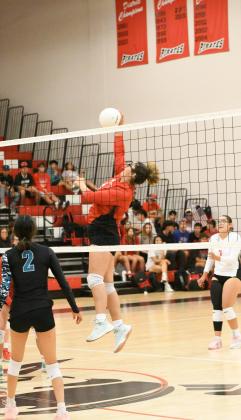 Mariah Pena, 3, reaches up high to volley the ball back to the Del Norte side at a recent volleyball game. The Lady Pirates are currently 5-7. Franklin Romero - CC