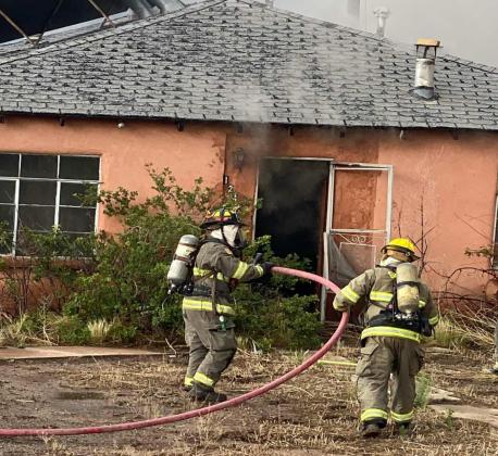 Fire Crews Stop Abandoned House Fire