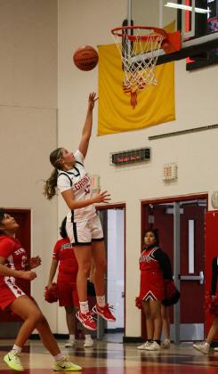 In this file photo Promise Garcia,13, with the photo finish for a bucket. The Lady Pirates are 11-9, 0-2 and are currently ranked 13th in 4A girls’ basketball. They will play Highland at home on January 27th and Belen away on February 2nd in district action. Franklin Romero - CC