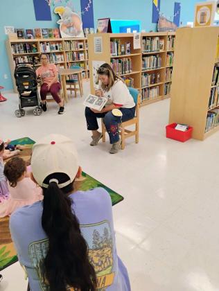 Children and families take part in Picasso Babies activities at the Grants Public Library during Week 8 of the Summer Reading Program. Picasso Babies, an art and sensory-play program for young children, was added to this summer’s programming and gave participants another hands-on way to learn, create and engage together. Courtesy Photo