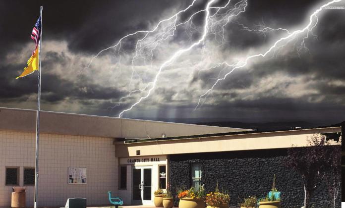 A dark cloud hangs over Grants City Hall and the Council Chambers following the councils recent decision to termintate the city managers contract. Photo illustration by Scott Ford - CC