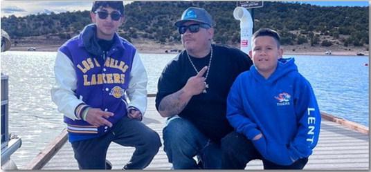 Tommy Lente, his nephew Mone (top left) and his son Antonio caught seven rainbow trout using Rooster Tail spinners on March 23. Antonio (top right) also reeled in this monster trout as part of an enjoyable family outing (above). Courtesy Photos