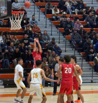 In this file photo Elijah Marquez, 2, shoots a trey at a research tournament in Gallup. The Pirates are currently ranked 11th in 4A and will start district play this week. Franklin Romero - CC