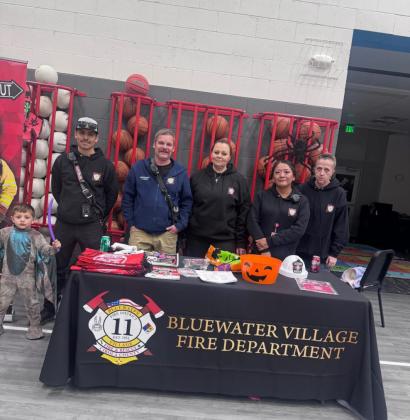 Firefighters from the Bluewater Village Fire Department joined the fun at the Bluewater Elementary School Carnival, where students played games and met their local heroes up close.