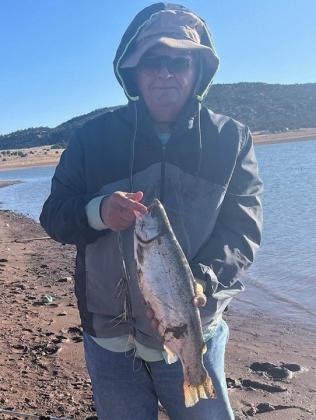 Bluewater Lake: Charles Cissna caught a trout using Salmon Peach Glitter PowerBait as part of a trip for the Albuquerque North Valley Senior Fishing Club on May 19. The group caught 19 fish in total, with most measuring between 14-16 inches long. Courtesy Photo