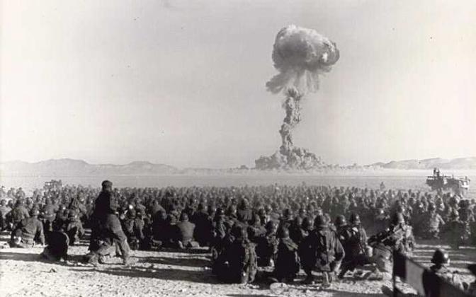 The Operation Buster-Jangle 'Dog' test, Nov. 1, 1951 – with troops participating in exercise Desert Rock I – was the first U.S. nuclear field exercise conducted on land. Troops shown are a mere 6 miles from the blast. Photo by Federal Government of the United States
