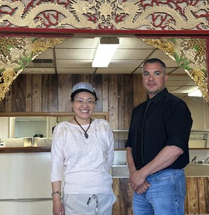Grants Mayor Erik Garcia joins 66 Buffet &amp;amp; Teppanyaki Grill owner Farrah on Friday, April 11, during the restaurant’s grand opening. Located in Grants, the new buffet features a fusion of Asian and American cuisine, including a live teppanyaki station where