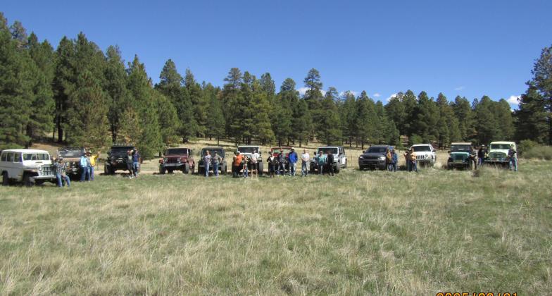 12 Jeeps lined up at Ojo Redondo meadow Photo by Roger Siegmann