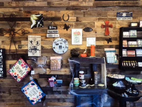 A shop wall featuring a variety of unique custom items that Custom Etching &amp; Gifts has to offer here in Grants. The shop is located at 200 W. Santa Fe, Suite D. Kylie Garcia - CC