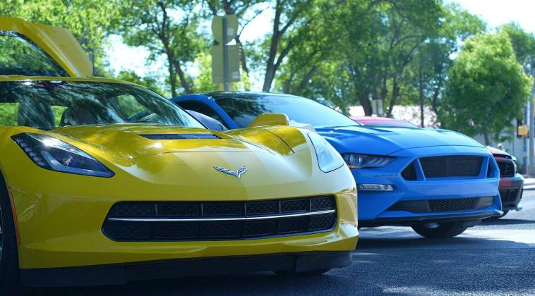 A bright yellow Corvette and bold blue Mustang turn heads on Route 66 during the Spokes on 66 Car Show, showcasing speed, style, and the spirit of the open road. Diego Lopez - CC
